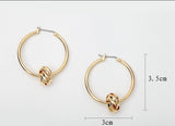 Shiny golden hoop earrings