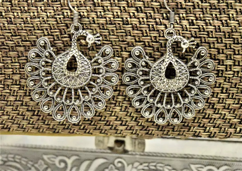 Silver Dancing Peacock Design Drop Earrings