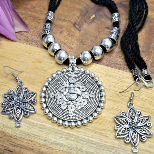 German Silver Ganesha Pendant Flower Earring Set