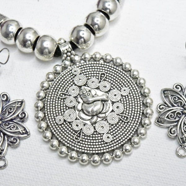 German Silver Ganesha Pendant Flower Earring Set