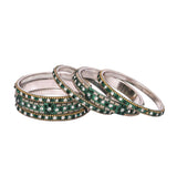 Shimmering set of bangles in dark green and golden