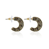 Crescent shaped golden metal earrings