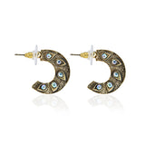 Crescent shaped golden metal earrings