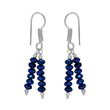 Long danglers in German silver with blue beads - The Fineworld